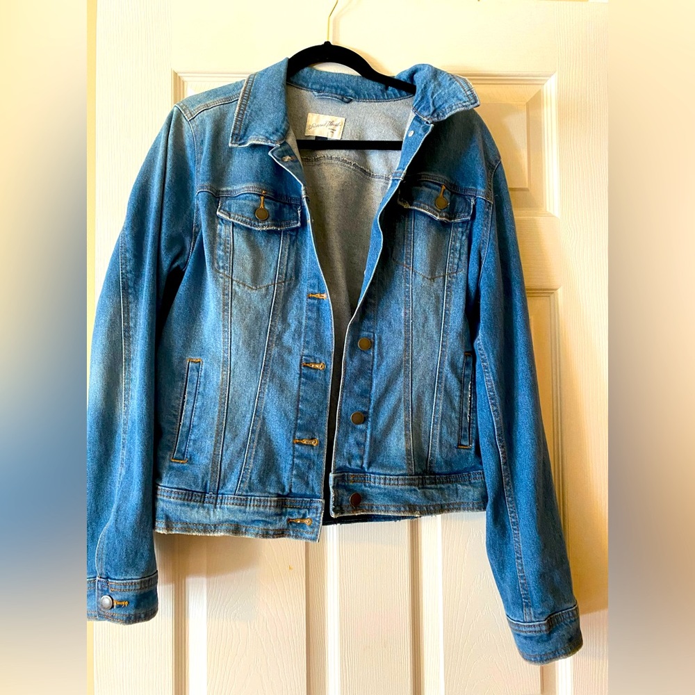 Lightly distressed, Jean jacket with stretch, woman’s sz large, medium blue